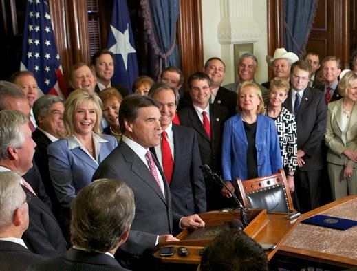 Texas Governor Rick Perry after a cerimonial signing of Senate Bill 14, which requires voters to present photo IDs upon registration and at the polls.
Flickr user: Covernor Rick Perry, https://flic.kr/p/9Mx7Xy