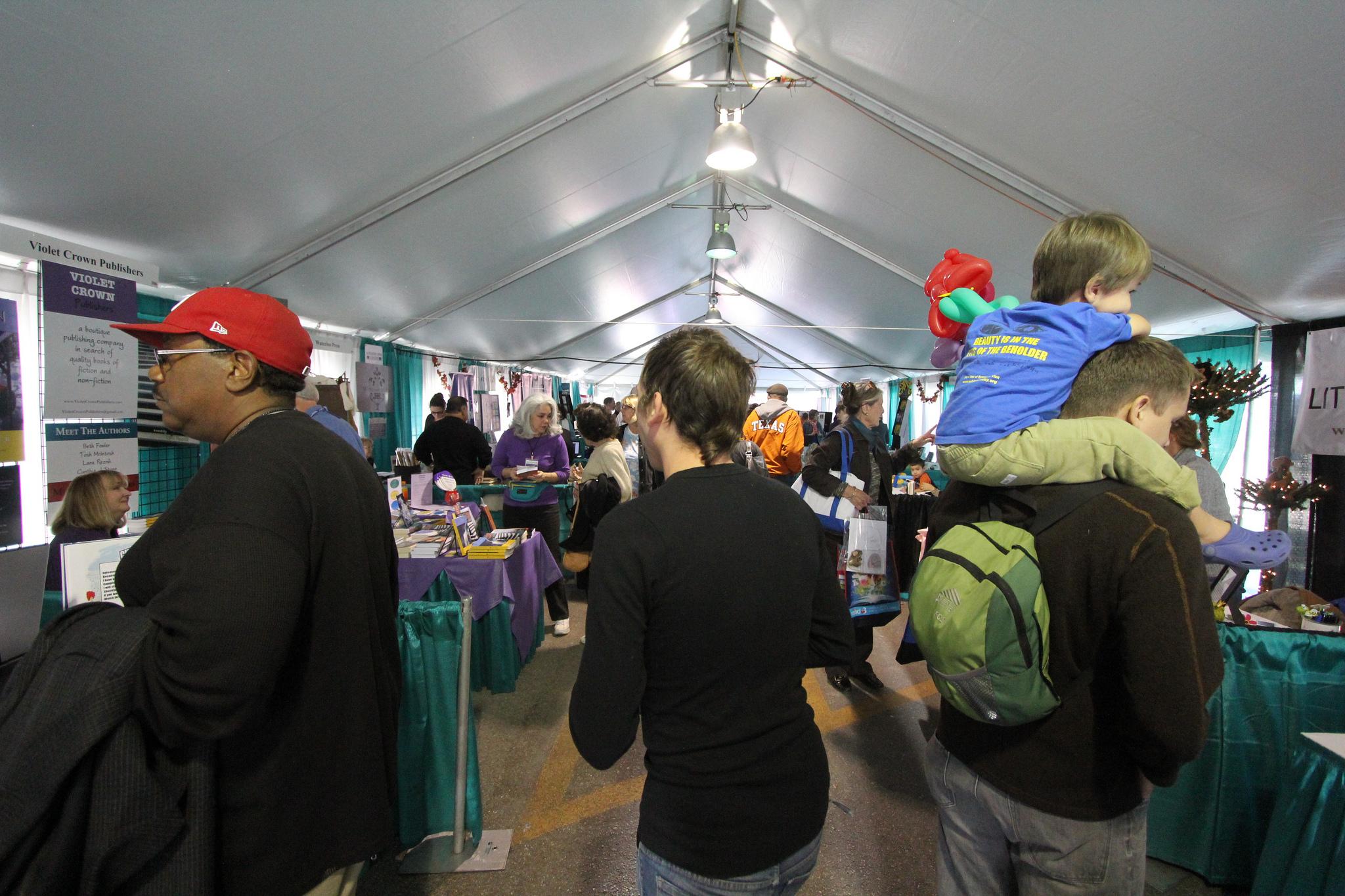 Vistors stroll through one of the outside tents at the 2012 Texas Book Festival
Texas State Library and Archives Commission