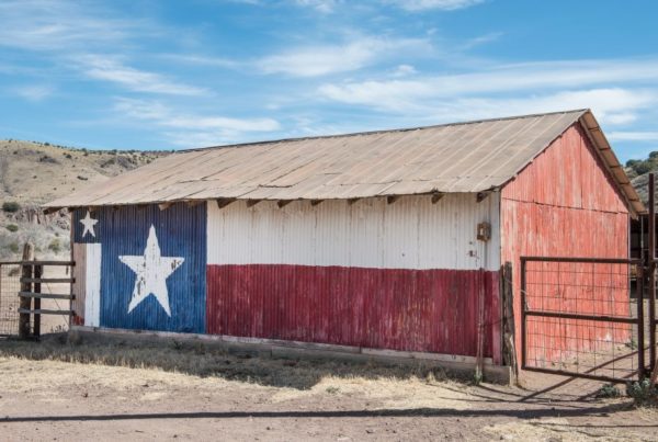 Texas flag on a barn wall