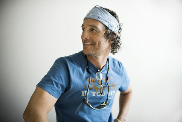 Matthew McConaughey grins for the camera in the KUT studios
