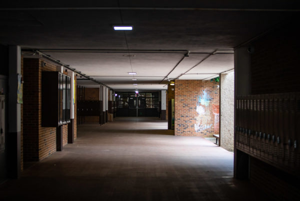 a dark high school hallway
