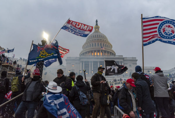 Protesters wave flags outside the U.S. Capitol