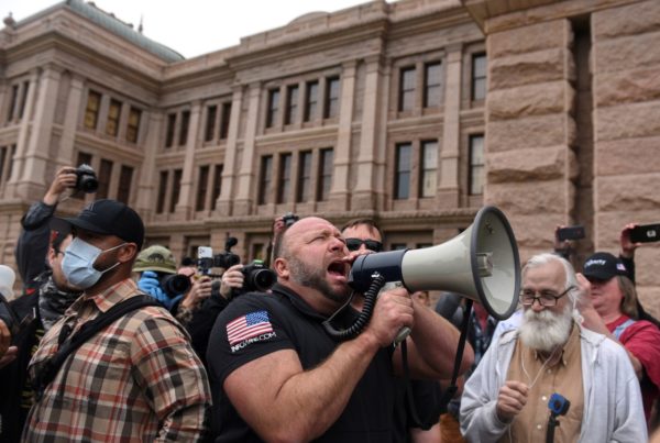 protesters at the texas capitol, one with a megaphone
