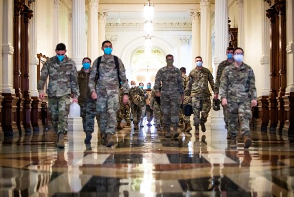 national guard troopers in the hall of the texas capitol