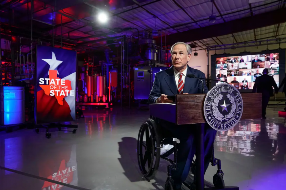 texas governor greg abbott giving an address in front of a lectern
