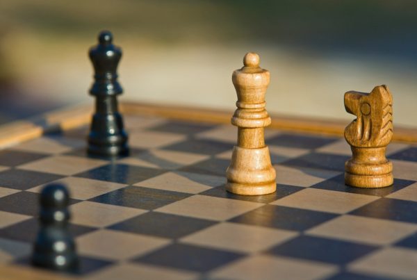 several chess pieces on a chess board