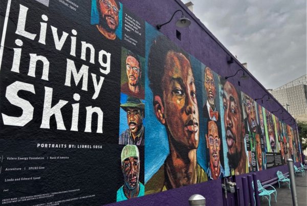 a mural on a building featuring 33 Black men from San Antonio