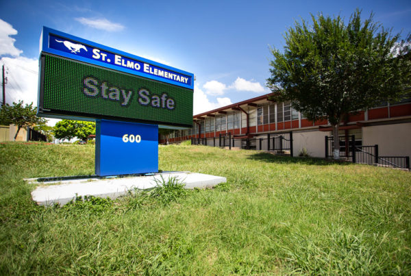 A sign outside St. Elmo Elementary School in Austin during the pandemic that says stay safe