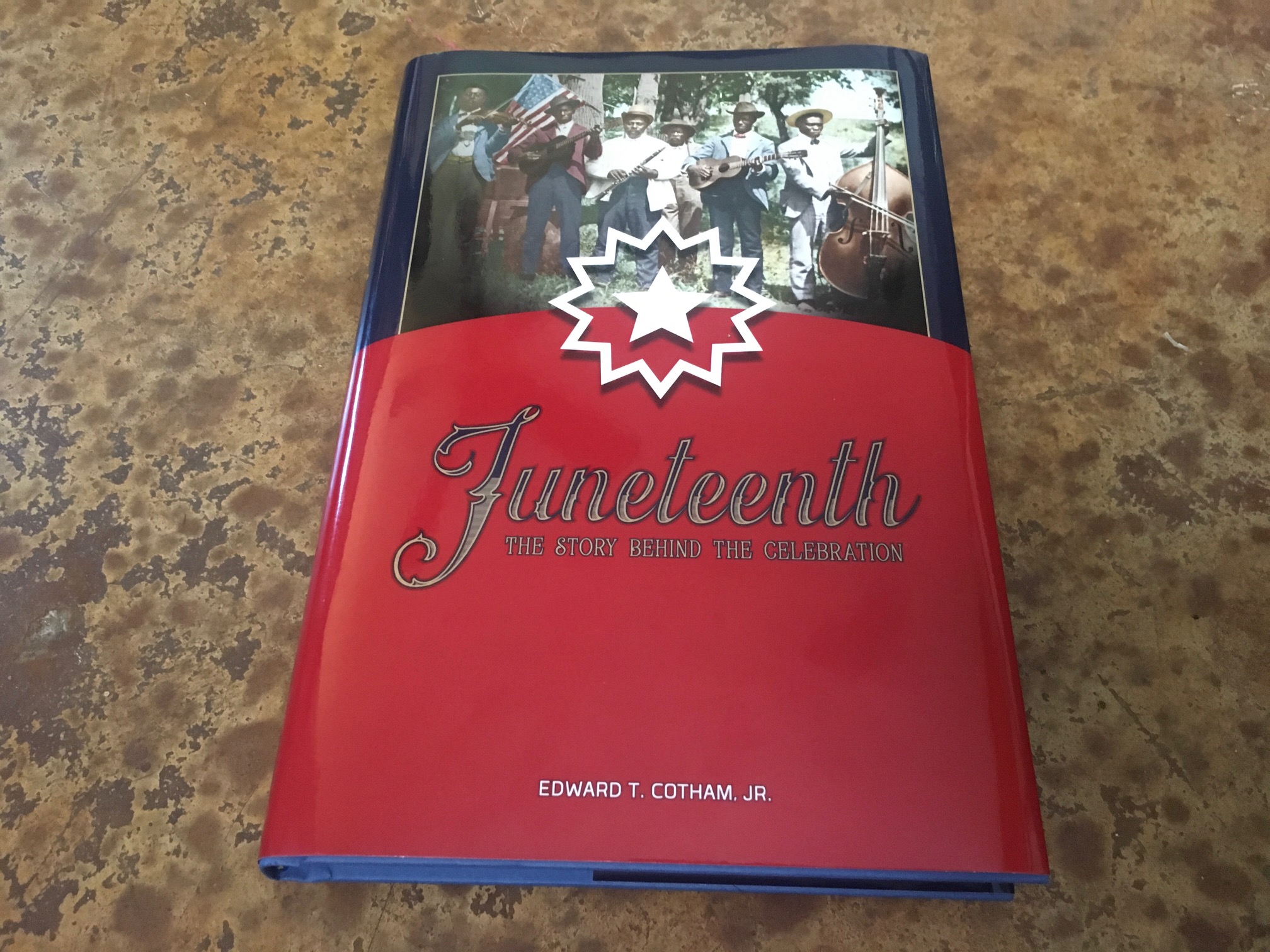 a photo of a hard cover copy of the Juneteenth book