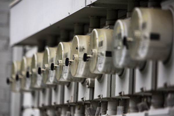 a row of residential electricity meters