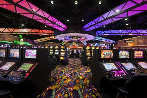 banks of slots and other gambling machines in a casino