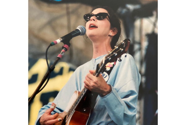 Nanci Griffith in mid-song, on stage