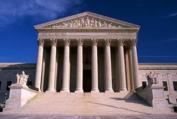 U.S. Supreme Court adopts ethics code under mounting public pressure