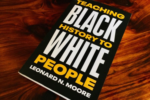 the book "Teaching Black History to White People" sits on a table