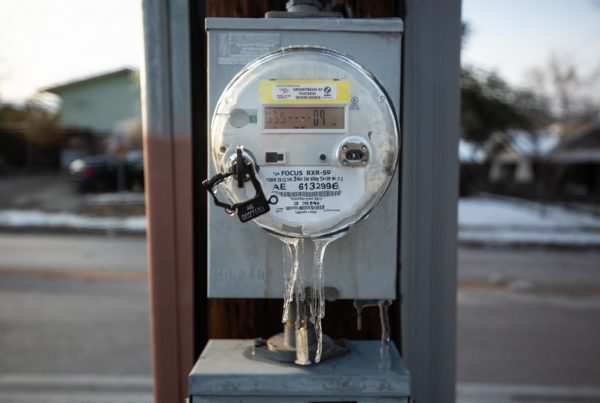 An electric meter in Austin covered in ice during the 2021 February freeze.