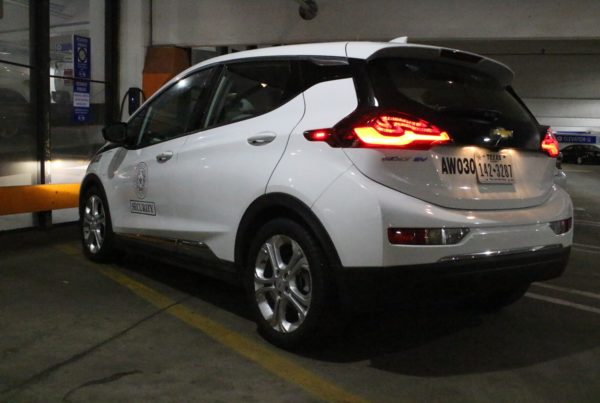 White Chevy bolt seen from the rear
