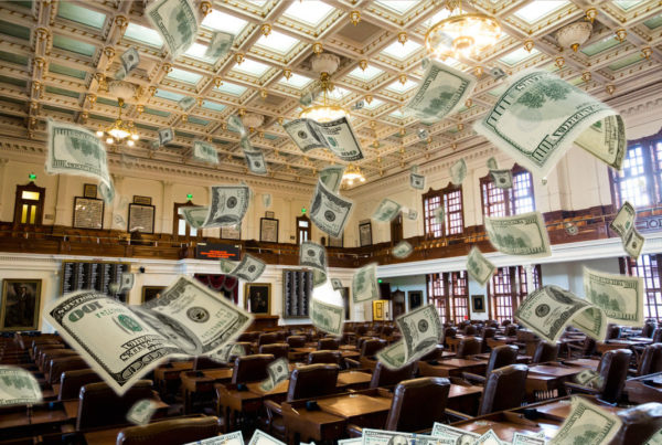 A photo illustration of money raining from the sky in the Texas House at the state Capitol Building.