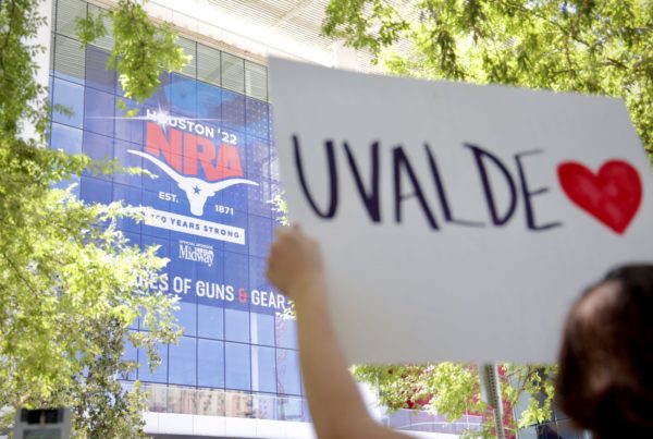 As the NRA meets in downtown Houston, hundreds rally in opposition