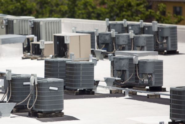 A view of air conditioning units on a building's roof