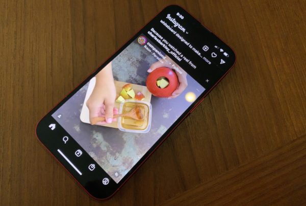 A phone showing an Instagram app with a video