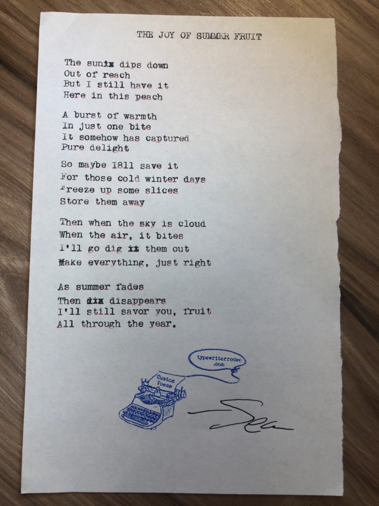 a photo of the typewritten poem on a torn half-sheet of paper