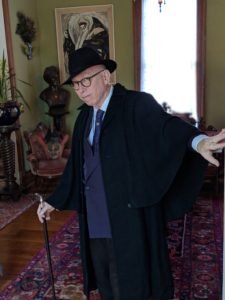 Mortician Dale Carter opens the door to his victorian home.