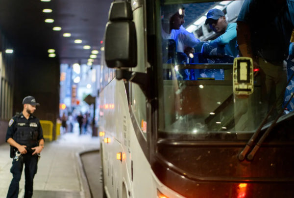 Migrants transported from Texas arrive at the Port Authority bus terminal in New York City on Aug. 25.