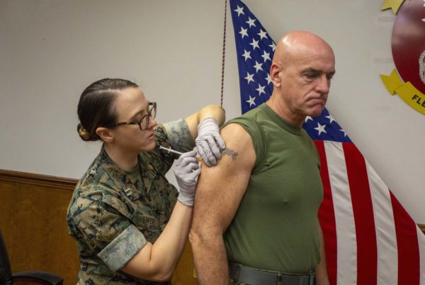 The military has lifted its vaccine mandate but won’t automatically reinstate troops who defied it
