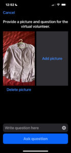 A screenshot from the Be My Eyes app shows a picture of a shirt that was taken by a smartphone. A space is provided below the image where users can type in a question to ask the Virtual Volunteer software about the image.