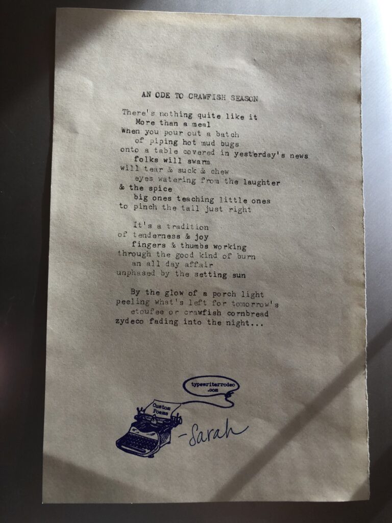 a photo of the typewritten poem on a torn half sheet of light yellow paper