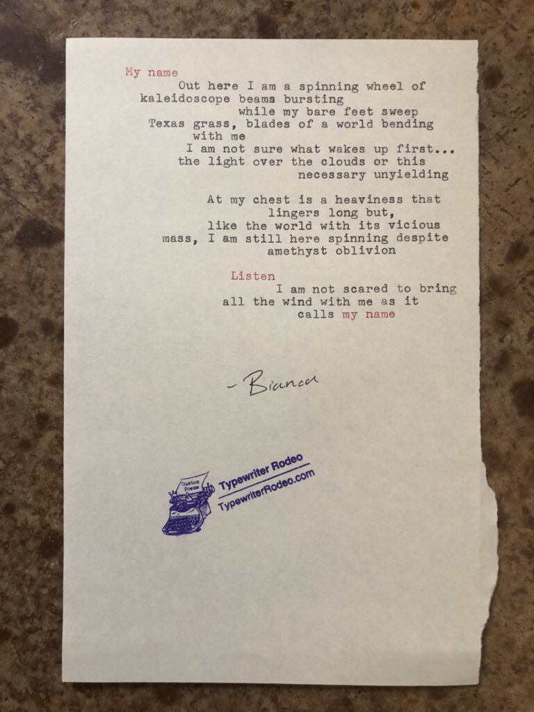 a photo of the typewritten poem on a torn half sheet of yellow paper