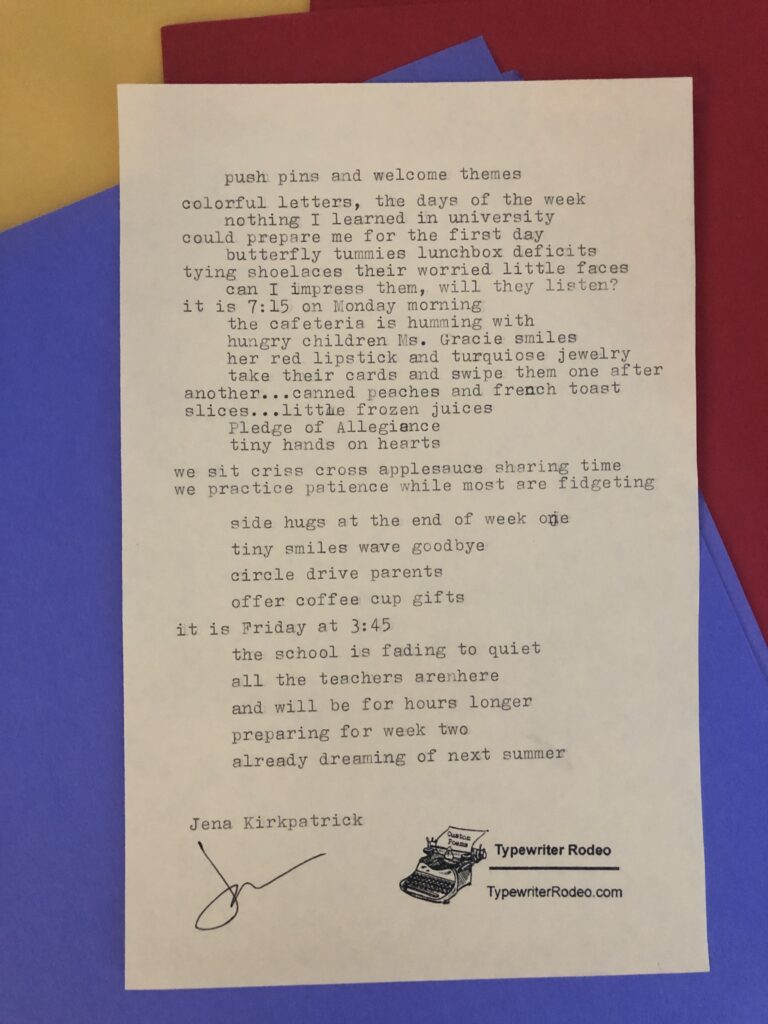 a photo of the typewritten poem on a torn half sheet of yellowish paper. it sits on a background of red, yellow and blue construction paper.