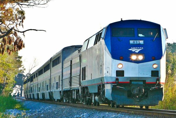 An exterior shot of an Amtrak passenger train