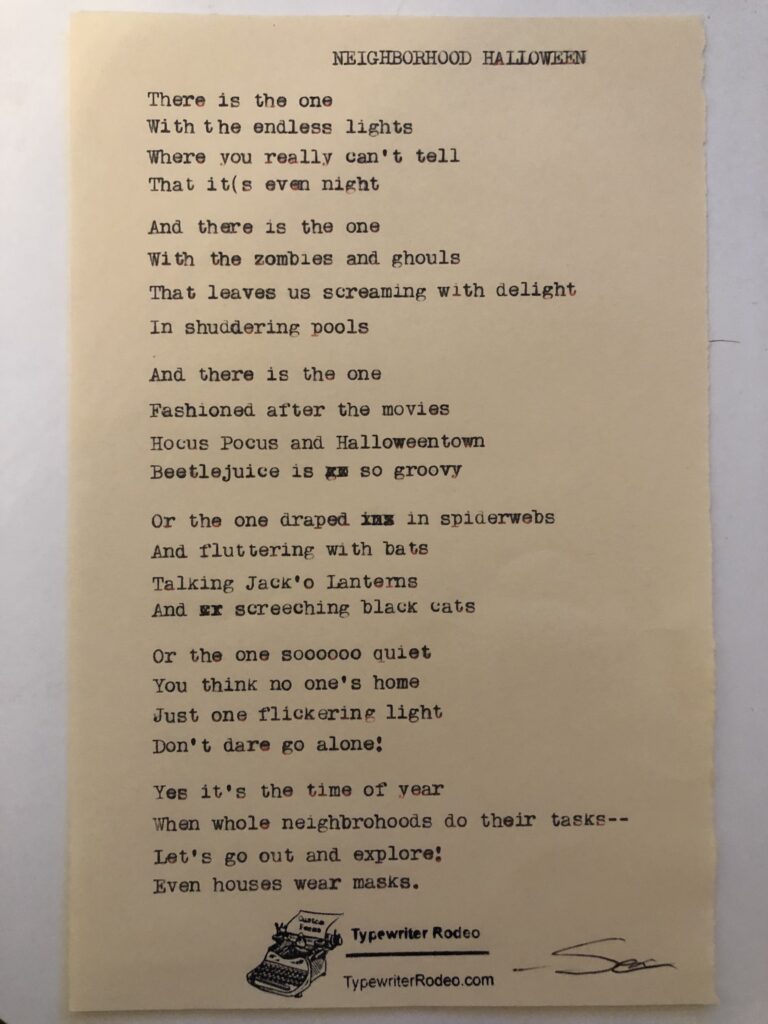 A photo of the typewritten poem on a torn half sheet of light yellow paper.