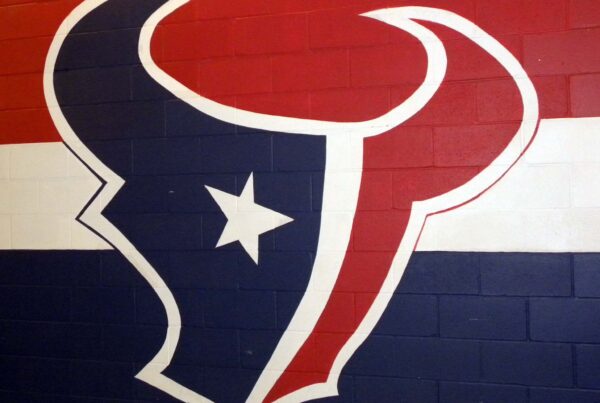 The red, white and blue Houston Texans logo painted onto a wall