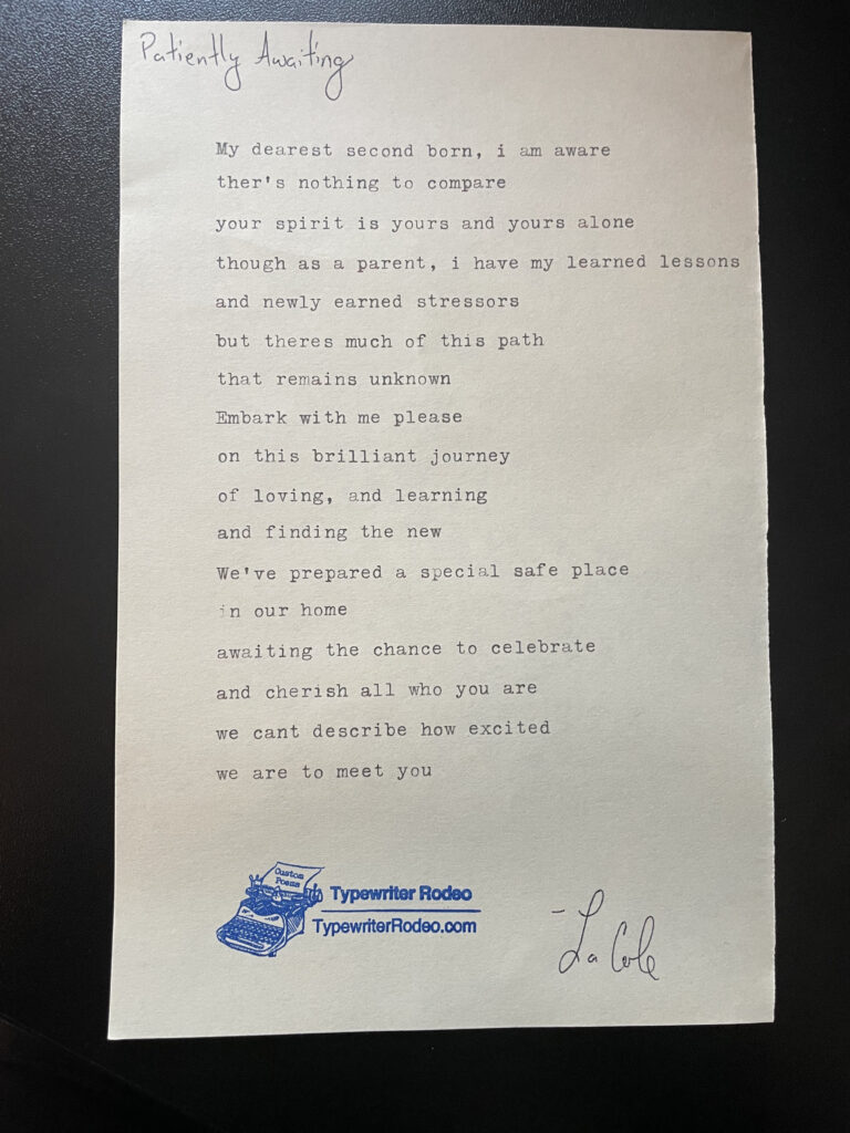 a photo of the typewritten poem on a half sheet of light yellow paper