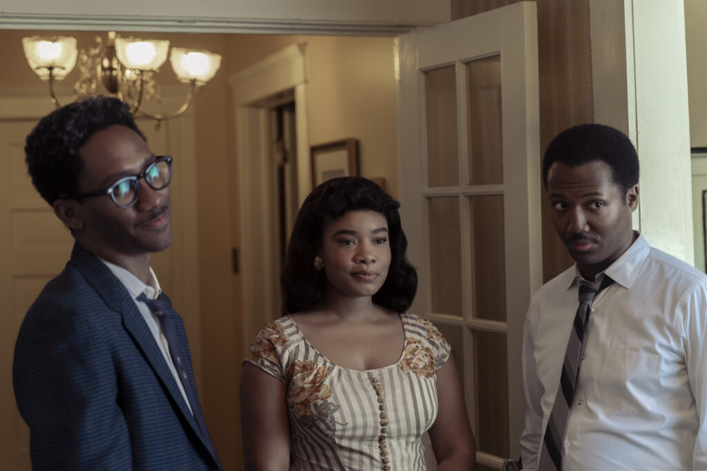 A photo of three actors in civil rights era clothing.