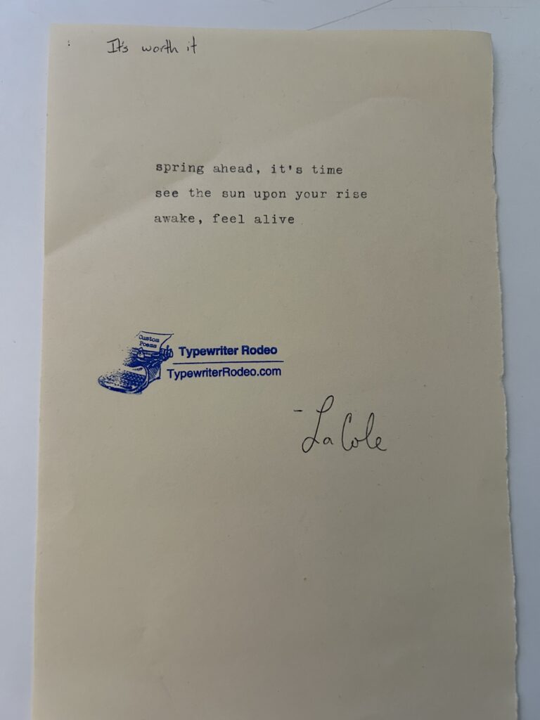 A photo of the typewritten poem on a torn halfsheet of light yellow paper.