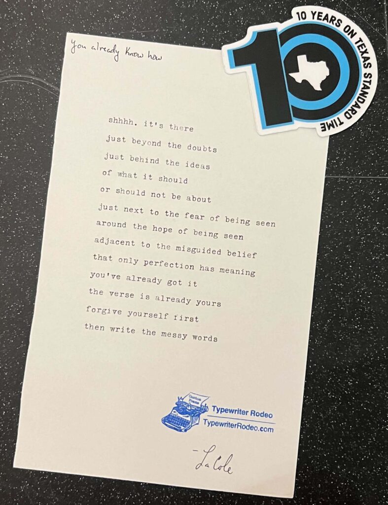 A photo of the typewritten poem on a sheet of light paper.