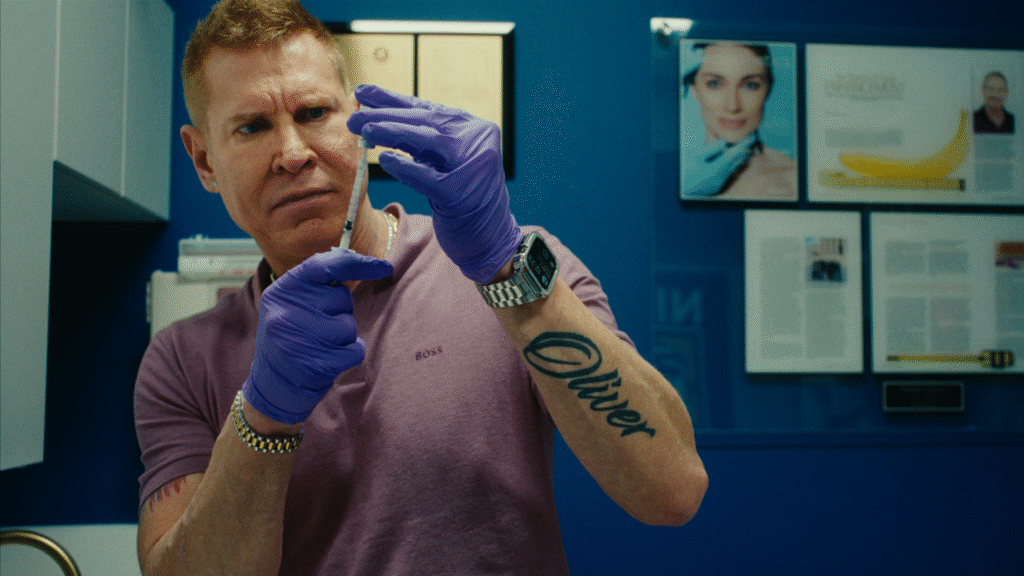 A man wearing gloves prepares a syringe in a still image from the film "Manhood."